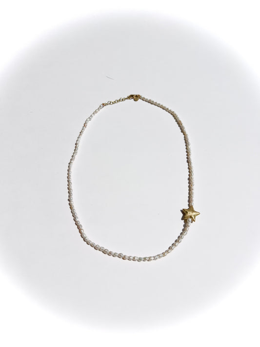 Rice pearl necklace with 18k gold bead